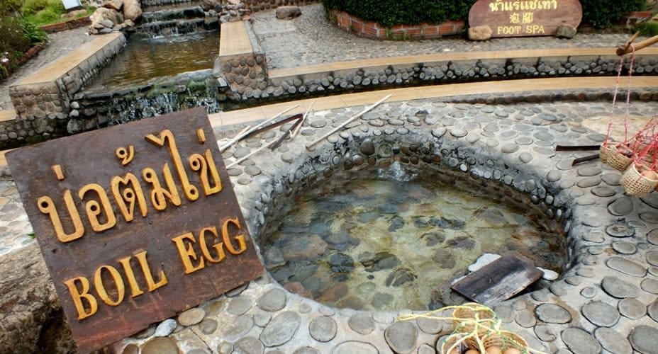 boiling eggs in chiang rai hot spring